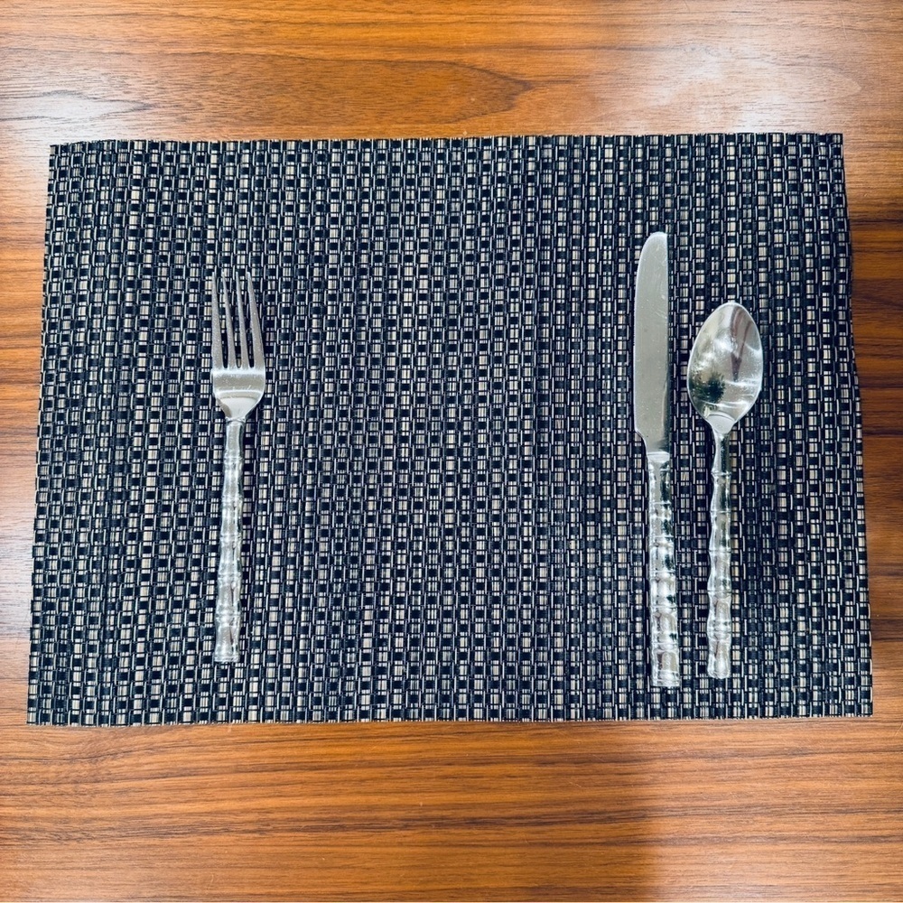 Elegant Black and Silver woven vinyl placemat set.